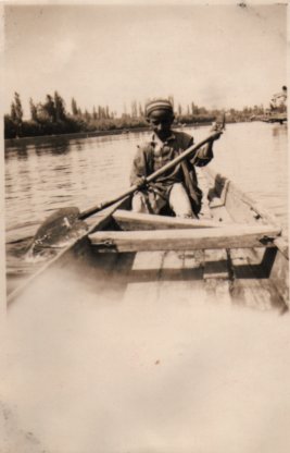 Chicko paddling a boat