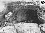 Photo of cave with hole in wall